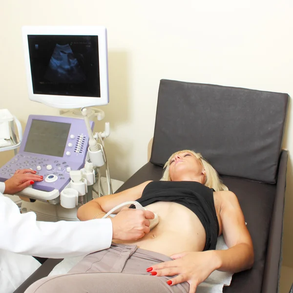 Woman has ultra sound check up