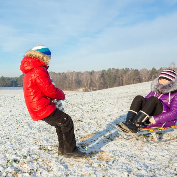 Happy family having fun in  snow