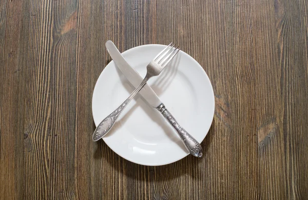 Antique fork, knife and plate