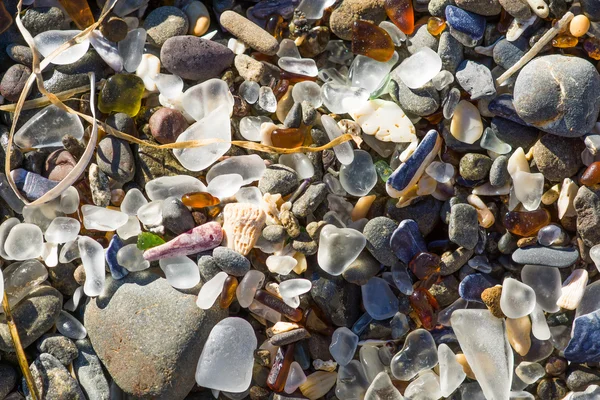 Ocean polished glass shards and stones