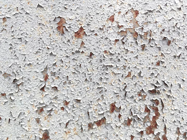 Old wall with peeling paint crack texture surface