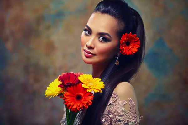 Woman with flowers portrait