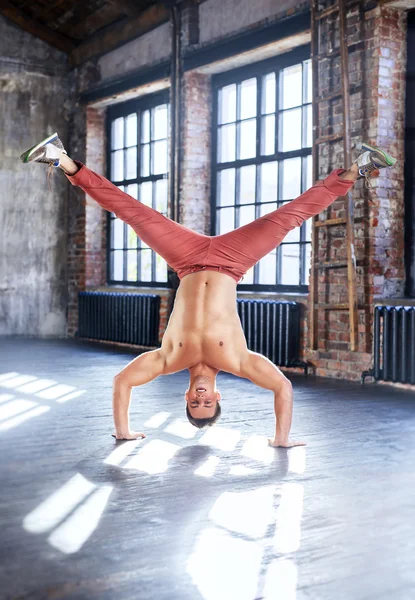 Young man break dancing