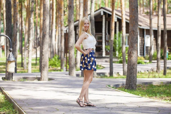 Portrait of young blonde woman