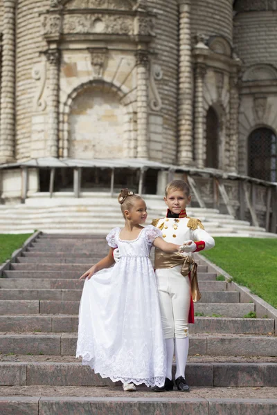 Childrens ballroom dance couple in suits