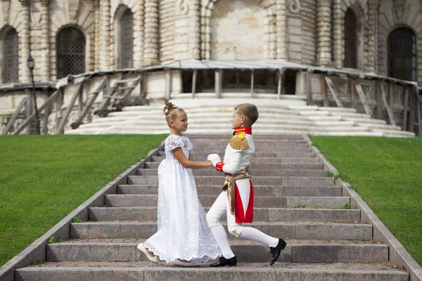 Childrens ballroom dance couple in suits