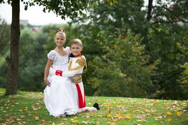 Childrens ballroom dance couple in suits