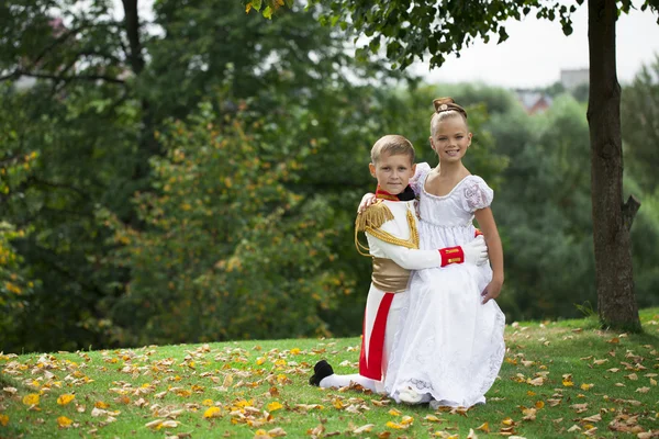 Childrens ballroom dance couple in suits