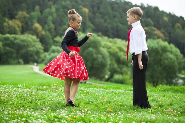 Childrens retro dance couple in suits