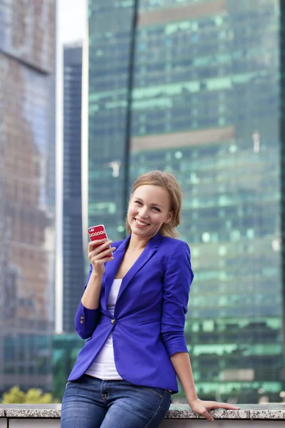 Beautiful young blonde calling by phone