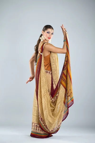 Young traditional Asian Indian woman in indian sari