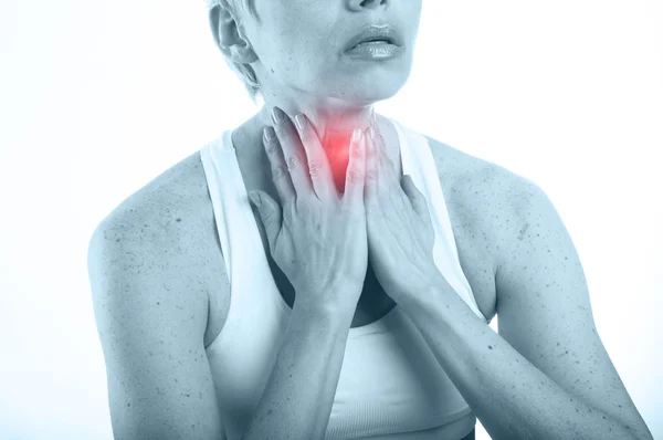 Woman with pain in throat