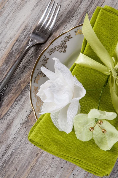 Dining table setting with Gardenia and bougainvillea