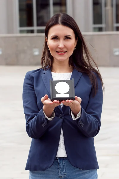 Happy Business woman with award