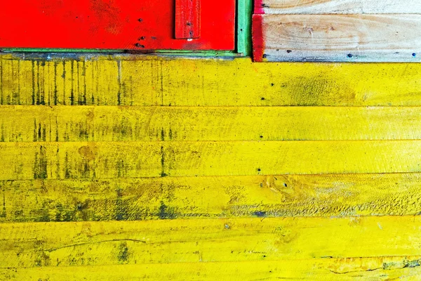 Yellow, red wood plank panels