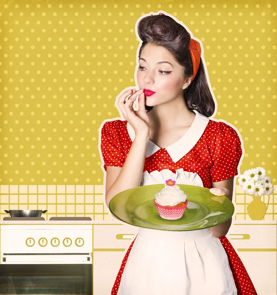 Young housewife holding sweet cupcake in her hands.Retro poster