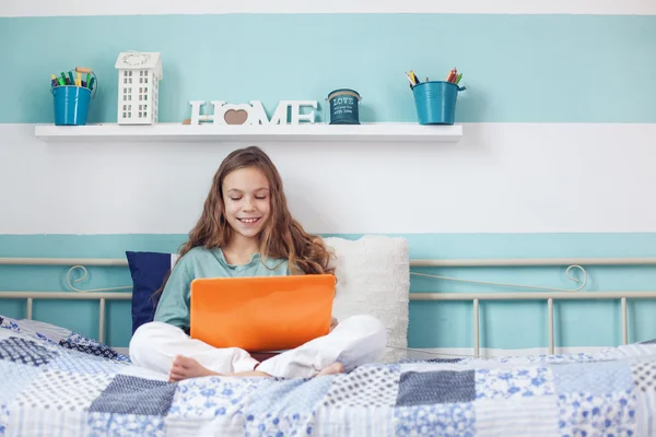 Child using laptop