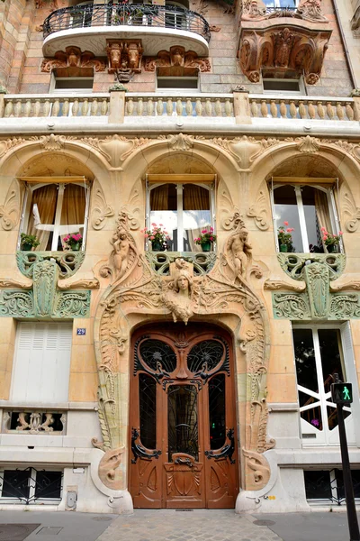 Facade of building at 29 Avenue Rapp by french architect Jules Lavirotte (1901) in Paris, France. In 1903 this house has won an architectural award for the most beautiful facade