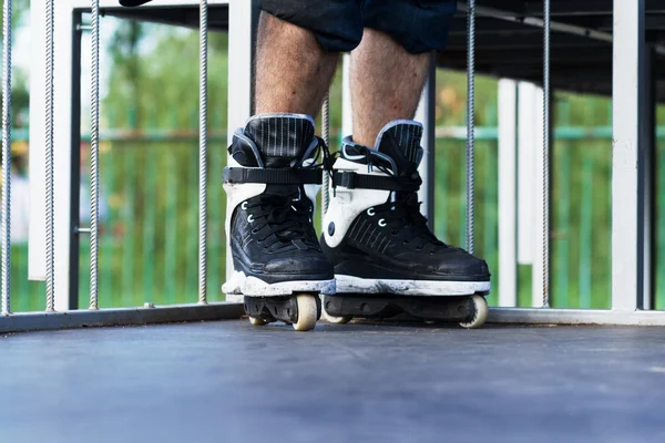 Aggressive inline rollerblading in a skatepark