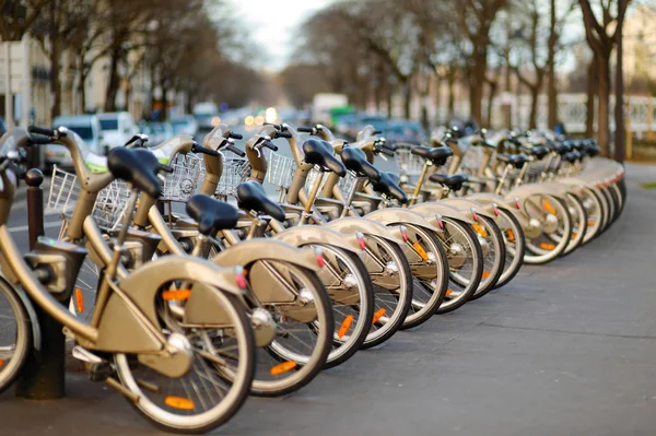 Row of city bikes for rent
