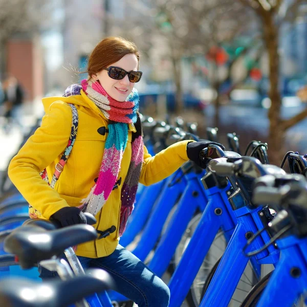 Woman ready to rent a city bike