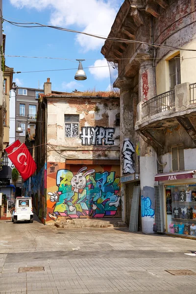The old building with modern graffiti picture on Istiklal Avenue