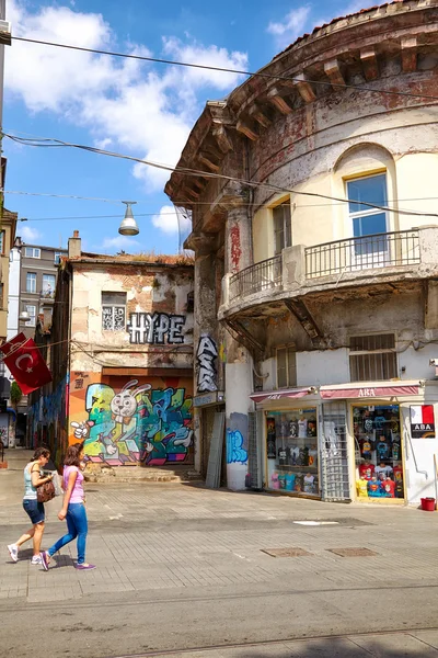 The old building with modern graffiti picture on Istiklal Avenue