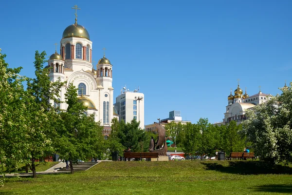 Blooming park in Yekaterinburg, with views of the Church on Bloo