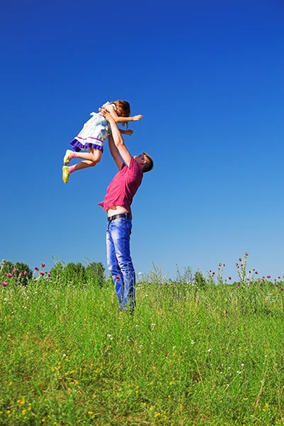 Father playing with daughter