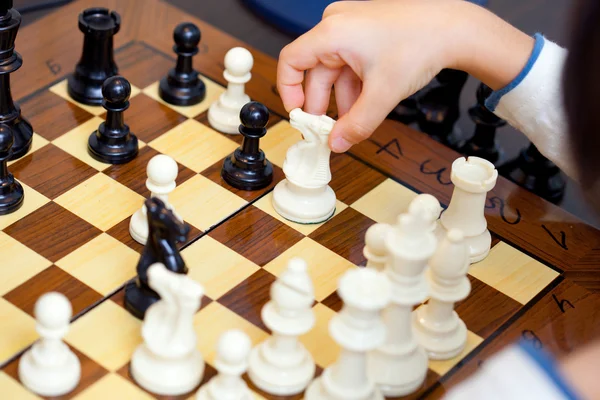 Boy playing chess