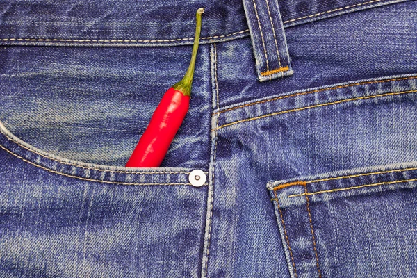 Chili peppers in a jeans pocket