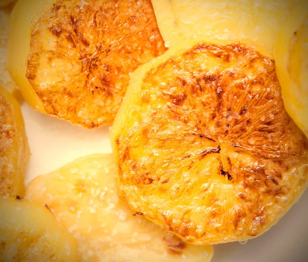 Slices of baked potatoes