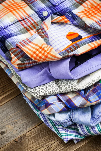 Bright shirts in a pile