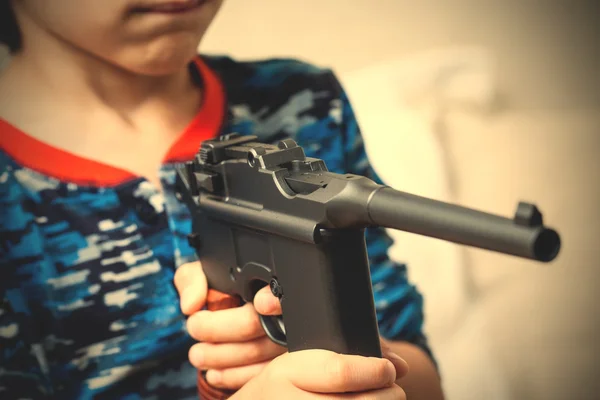 Boy with submachine gun Mauser