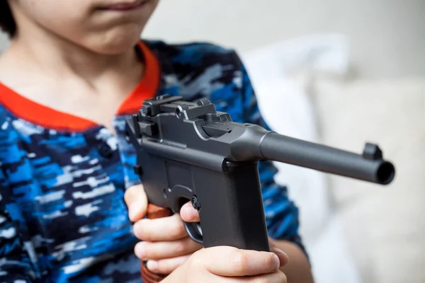 Boy with submachine gun Mauser