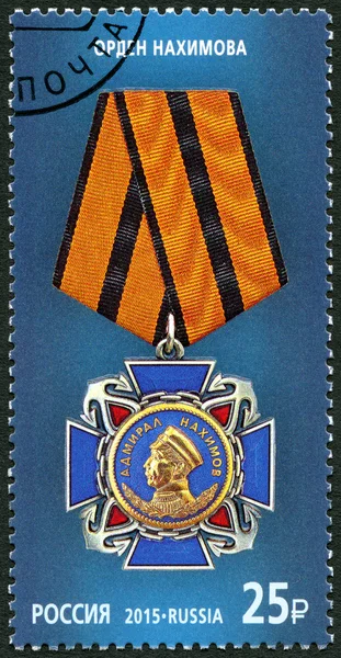 RUSSIA - 2015: shows The Order of Nakhimov on the blue background, series State awards of the Russian Federation