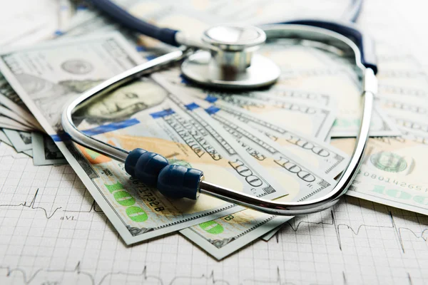 Dollars banknotes with stethoscope