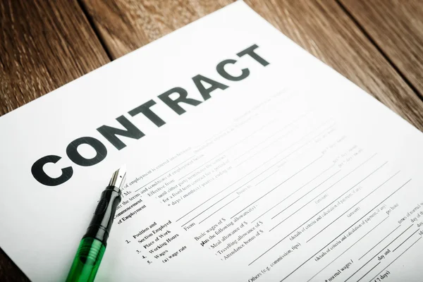 Pen on contract papers