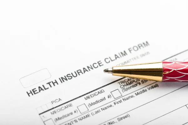 Pen on insurance claim form