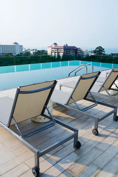 Swimming pool on roof deck building.