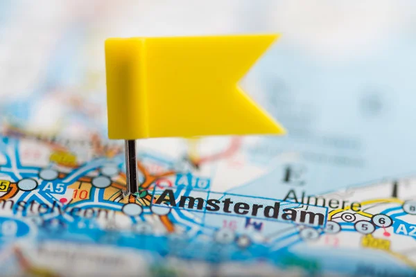 Amsterdam on map with flag
