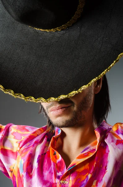 Young mexican man wearing sombrero