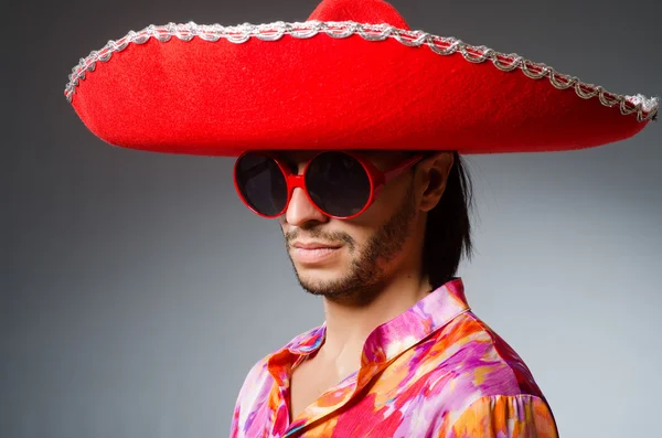 Young mexican man wearing sombrero