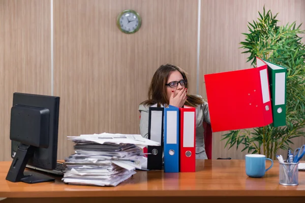 Businesswoman under stress working in the office