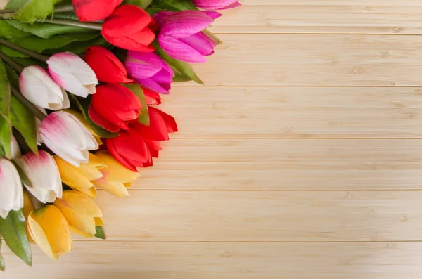 Tulips flowers arranged with copyspace for your text