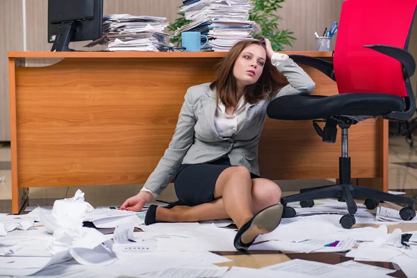 Businesswoman under stress working in the office