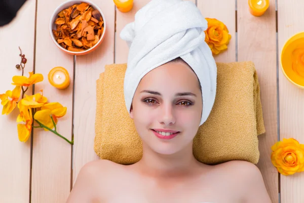 Young woman in spa health concept