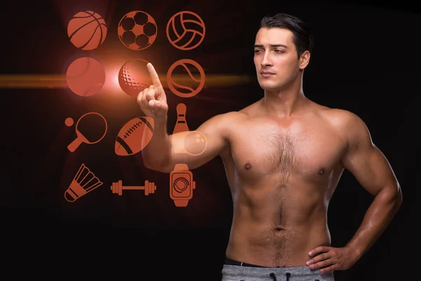 Young muscular man in sports concept