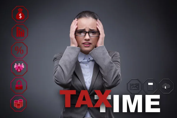 Businesswoman in business tax concept