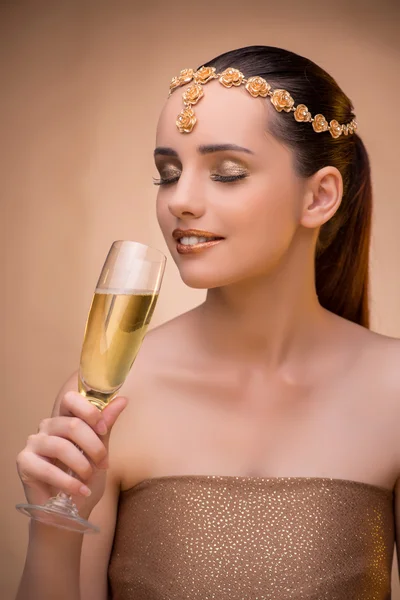 Young woman with champagne glass